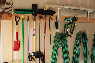 garage organizing tools hoses